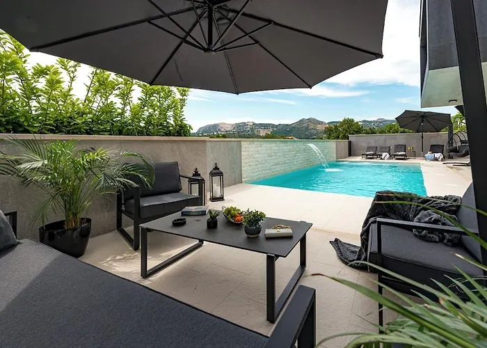 Luxury Black Cube With Heated Pool